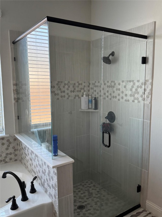 bathroom with independent shower and bath and sink