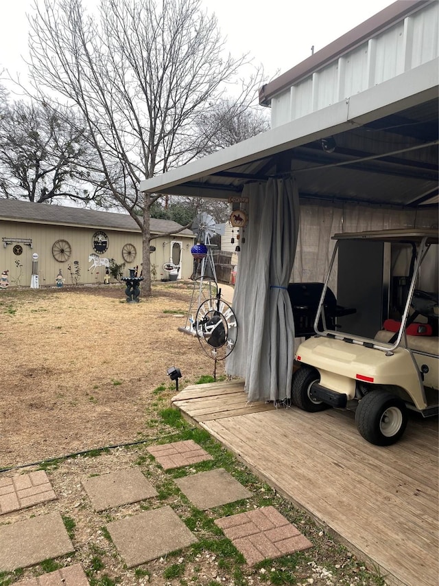 view of yard featuring a carport