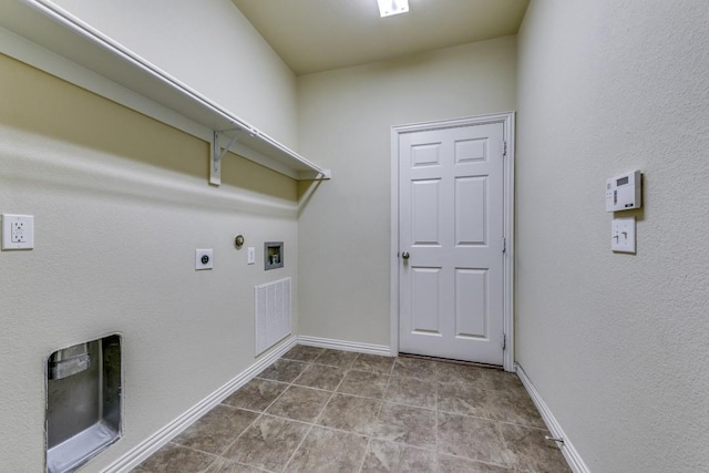 laundry area featuring gas dryer hookup, hookup for an electric dryer, and hookup for a washing machine