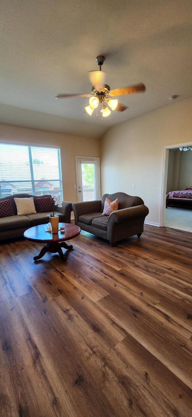2821 Fordham Rd, Plano, TX 75025 - living area featuring wood finished floors, ceiling fan, and a textured ceiling