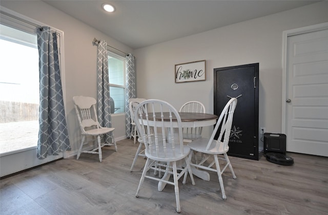 dining room with light wood-type flooring