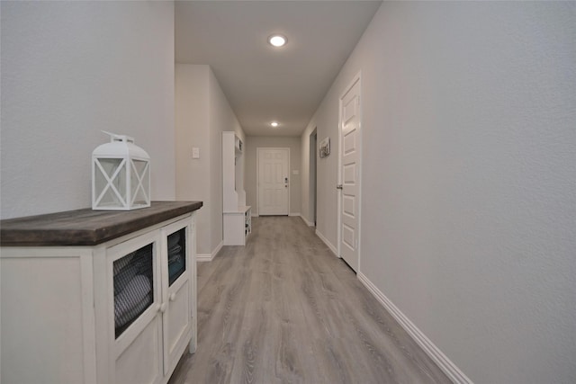 hall featuring light hardwood / wood-style floors