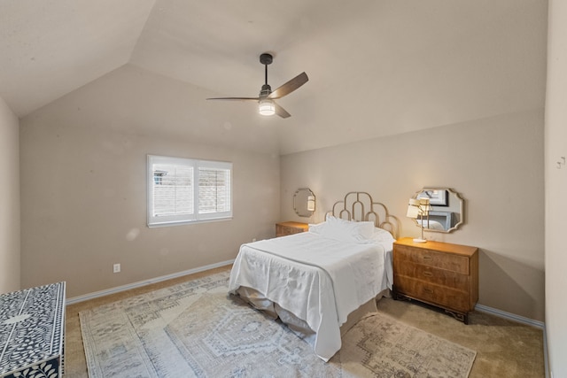 carpeted bedroom with lofted ceiling and ceiling fan