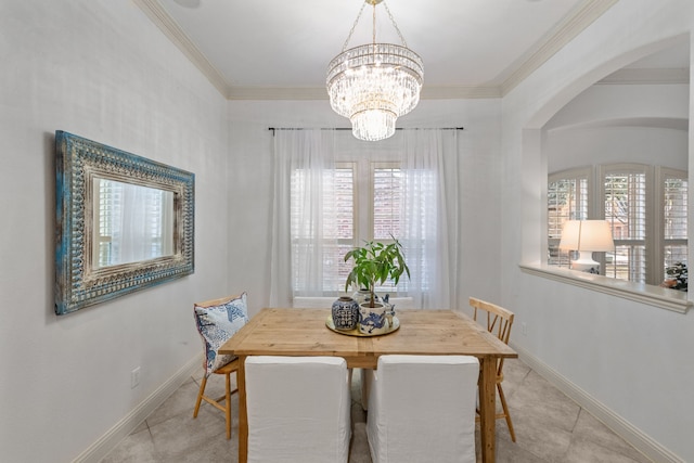 dining space featuring ornamental molding, light tile patterned floors, and a chandelier