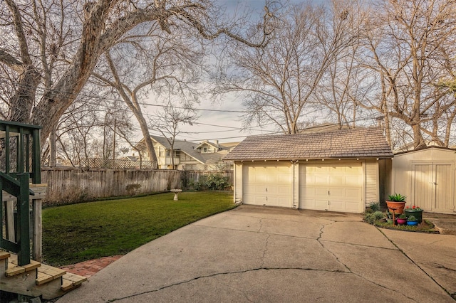 garage with a yard