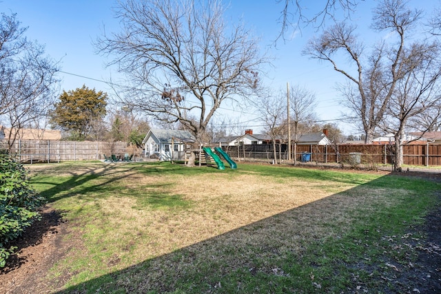 view of yard with a playground