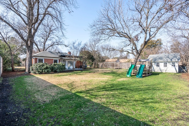 view of yard with a playground