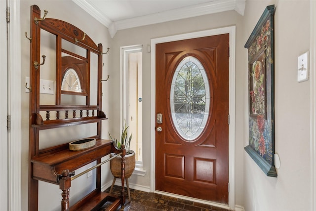 entryway with baseboards and ornamental molding