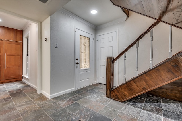 entrance foyer featuring crown molding