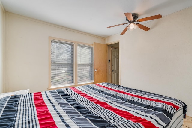 bedroom featuring ceiling fan