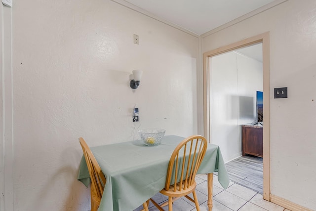 dining area with light tile patterned flooring