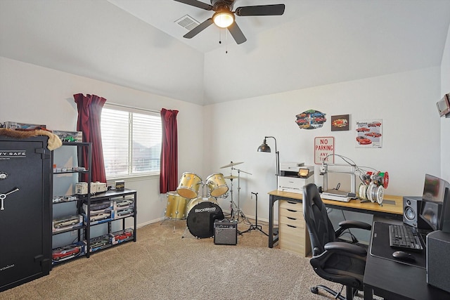 carpeted office space with lofted ceiling and ceiling fan