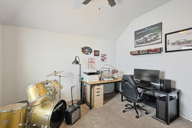 office area with vaulted ceiling, light colored carpet, and ceiling fan