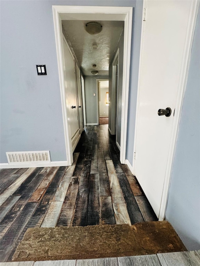 hall featuring dark hardwood / wood-style flooring