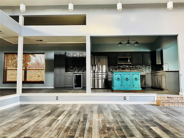 interior space featuring sink and light hardwood / wood-style flooring