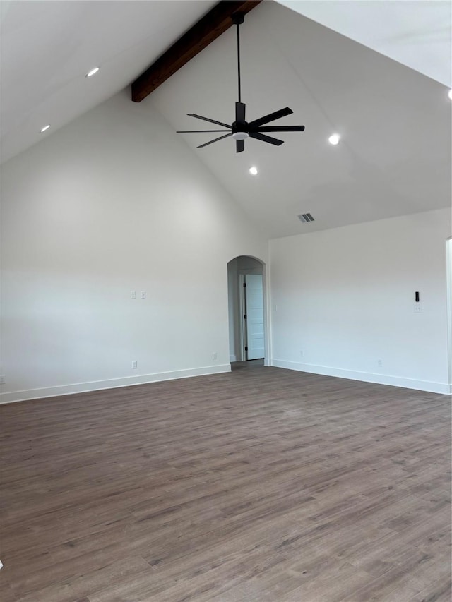 unfurnished living room featuring beam ceiling, wood-type flooring, high vaulted ceiling, and ceiling fan