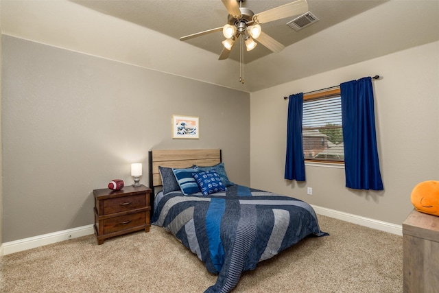 bedroom with baseboards, visible vents, and carpet flooring