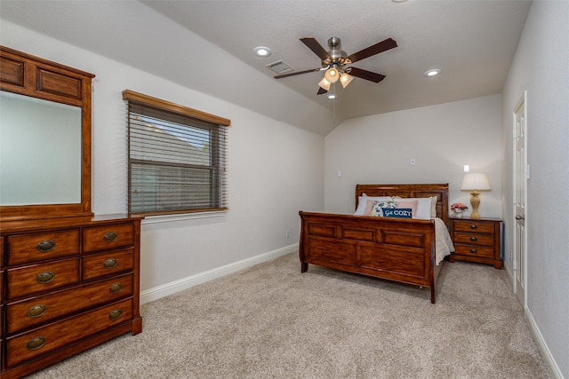 bedroom featuring lofted ceiling, recessed lighting, visible vents, light carpet, and baseboards