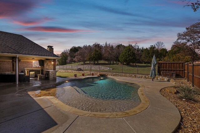 view of swimming pool with a patio area and a lawn