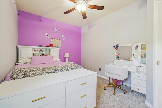 bedroom with light colored carpet and ceiling fan