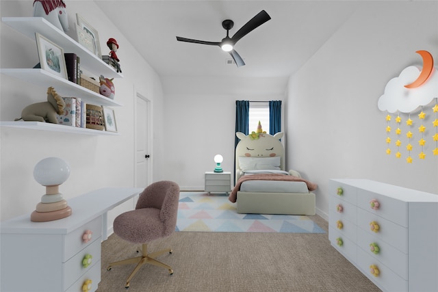 bedroom with light carpet and ceiling fan