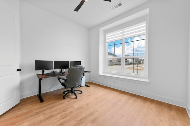 office area featuring light hardwood / wood-style floors and ceiling fan