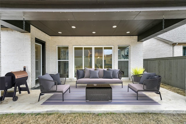 view of patio featuring grilling area and outdoor lounge area