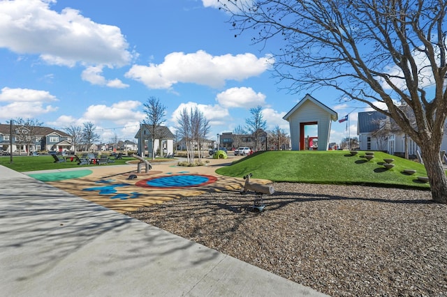 view of playground with a yard