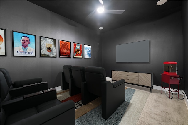 carpeted cinema with ceiling fan