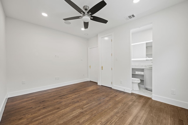 unfurnished bedroom with recessed lighting, wood finished floors, visible vents, and baseboards
