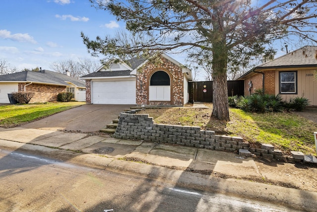 ranch-style house featuring a garage