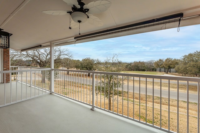 balcony featuring ceiling fan