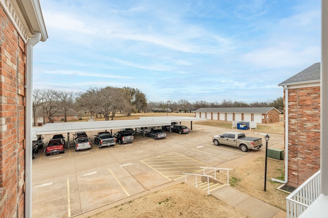 view of car parking featuring a carport