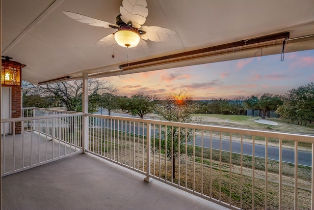 balcony at dusk with ceiling fan