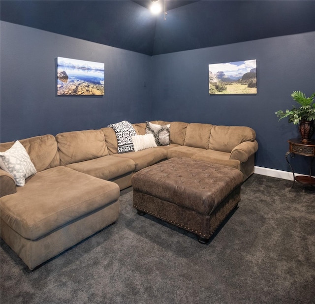 carpeted living room featuring vaulted ceiling