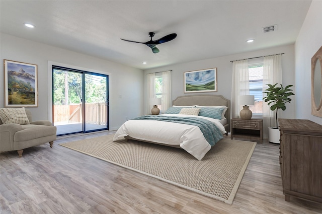 bedroom with ceiling fan, light hardwood / wood-style floors, and access to outside