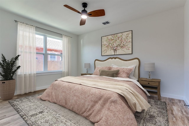 bedroom featuring ceiling fan and light wood-type flooring