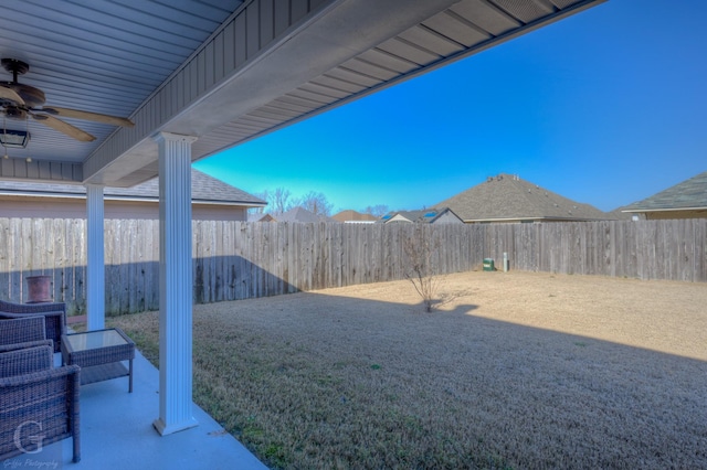 view of yard featuring ceiling fan