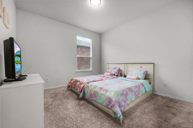 bedroom featuring light colored carpet