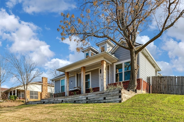 view of front facade featuring a front yard