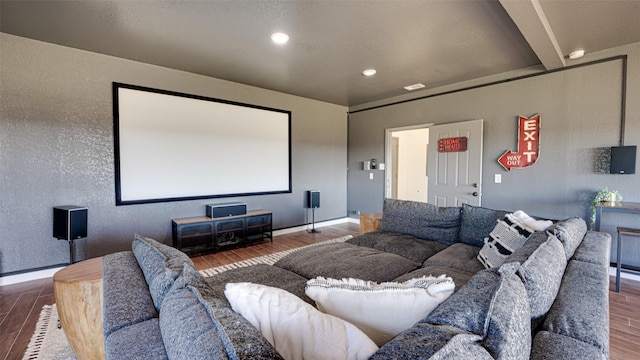 cinema featuring recessed lighting, wood finished floors, and baseboards