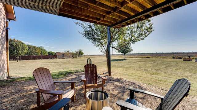 view of yard with a rural view