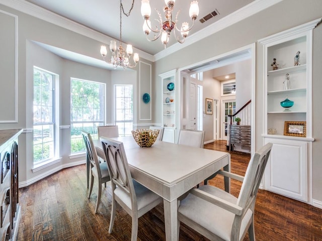 199 Pecan Crossing Ct, Gunter, TX 75058 - dining room with a chandelier, built in features, healthy amount of natural light, dark wood-style flooring, and ornamental molding