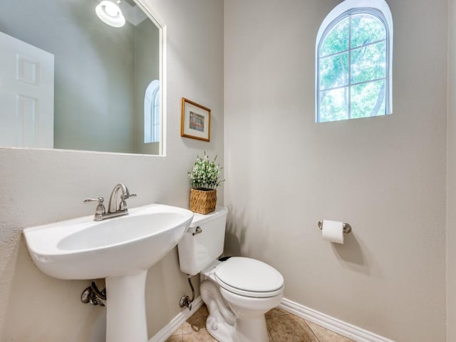 199 Pecan Crossing Ct, Gunter, TX 75058 - bathroom featuring baseboards and tile patterned flooring