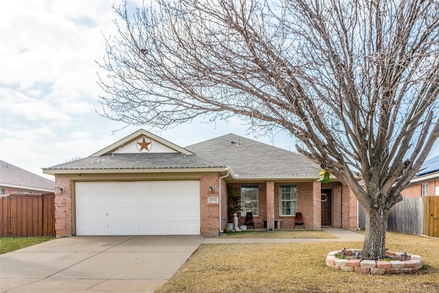 single story home featuring a garage and a front yard