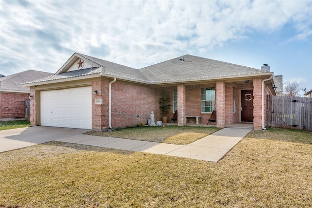 ranch-style house with a garage and a front yard