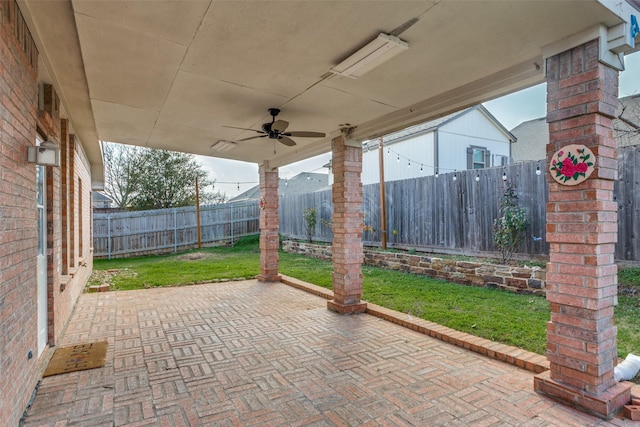 view of patio / terrace featuring ceiling fan