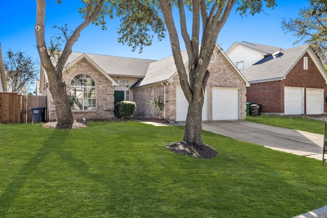 ranch-style home with a garage and a front yard