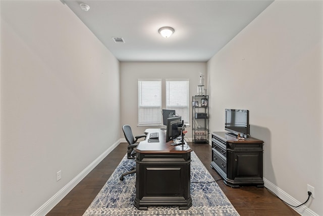 office space with dark hardwood / wood-style flooring