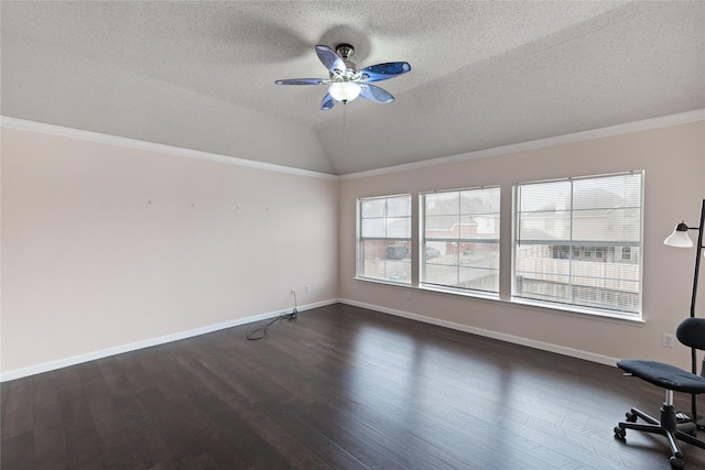 interior space featuring ornamental molding, lofted ceiling, ceiling fan, and dark hardwood / wood-style flooring